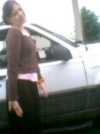 crissy_standing_next_to_car_full_lenght.jpg
